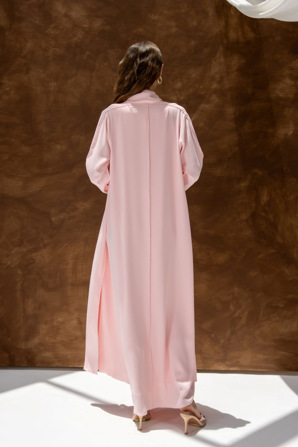Selected Lines pink abaya classic evening dress for special occasions with long sleeves and flowing fabric