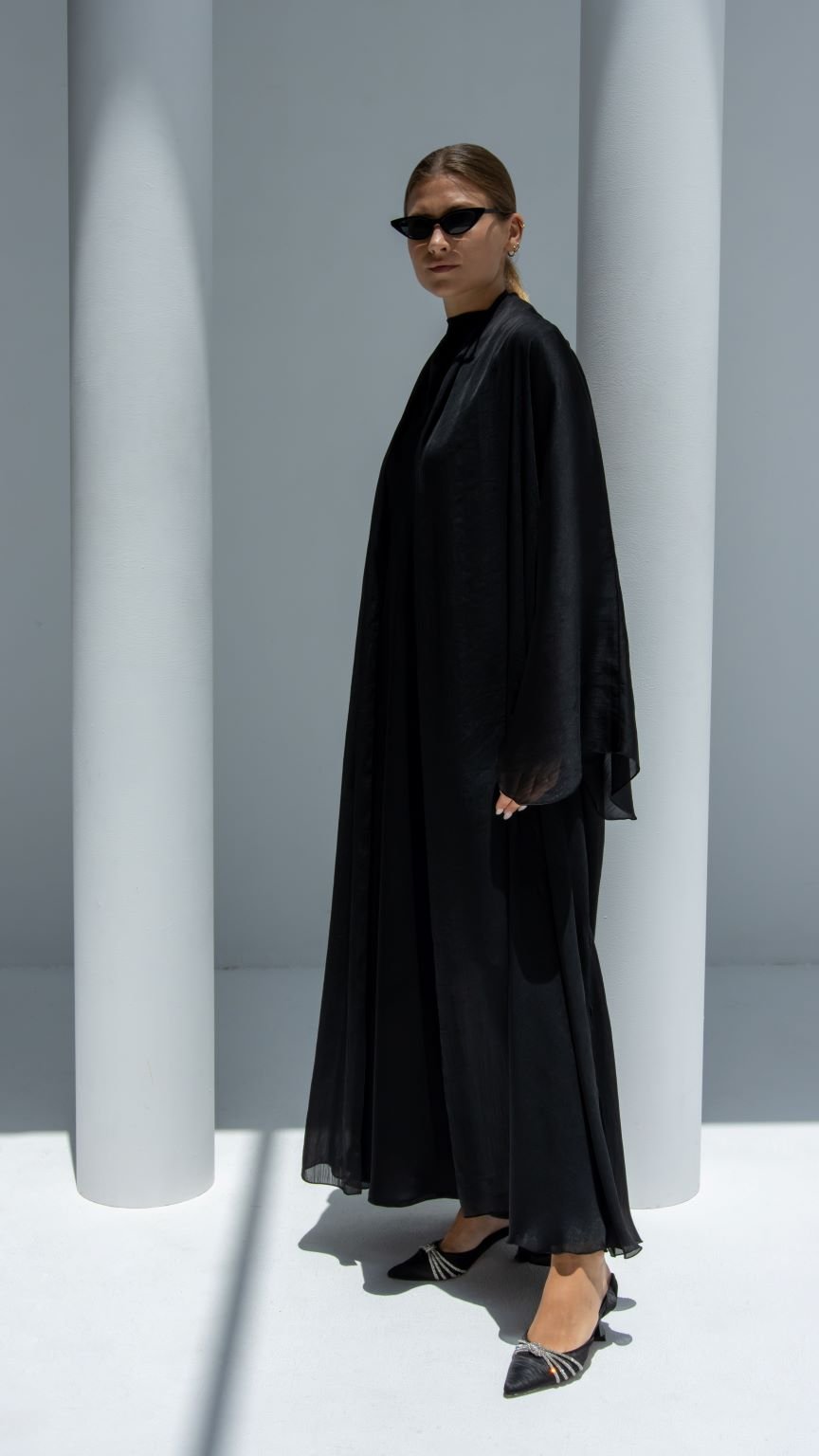 Side profile of Afra Abaya highlighting the flowing design and luxurious fabric texture | Selected Lines