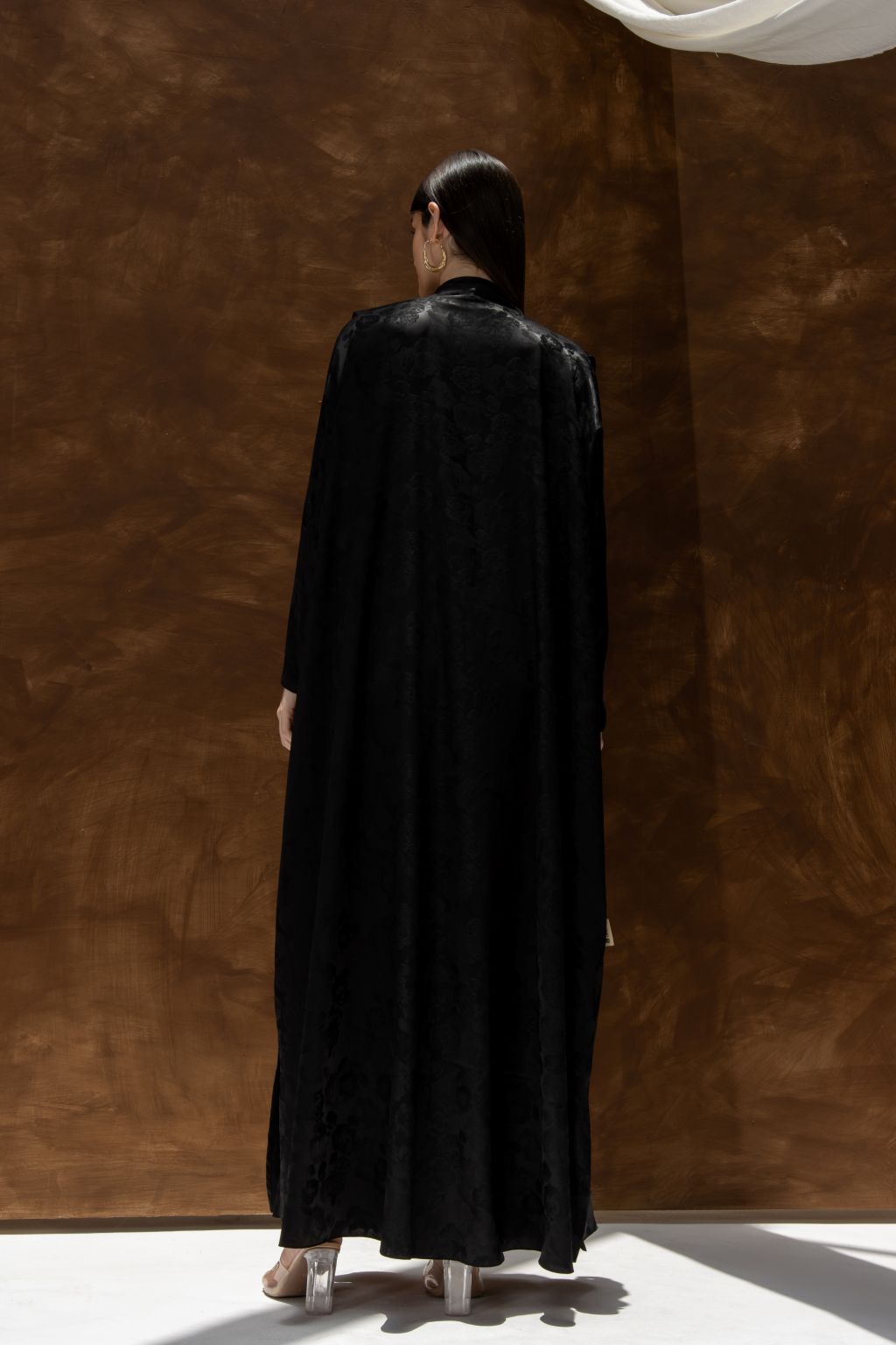 Selected Lines black Bahraini abaya for women with elegant long flowing design shown from back