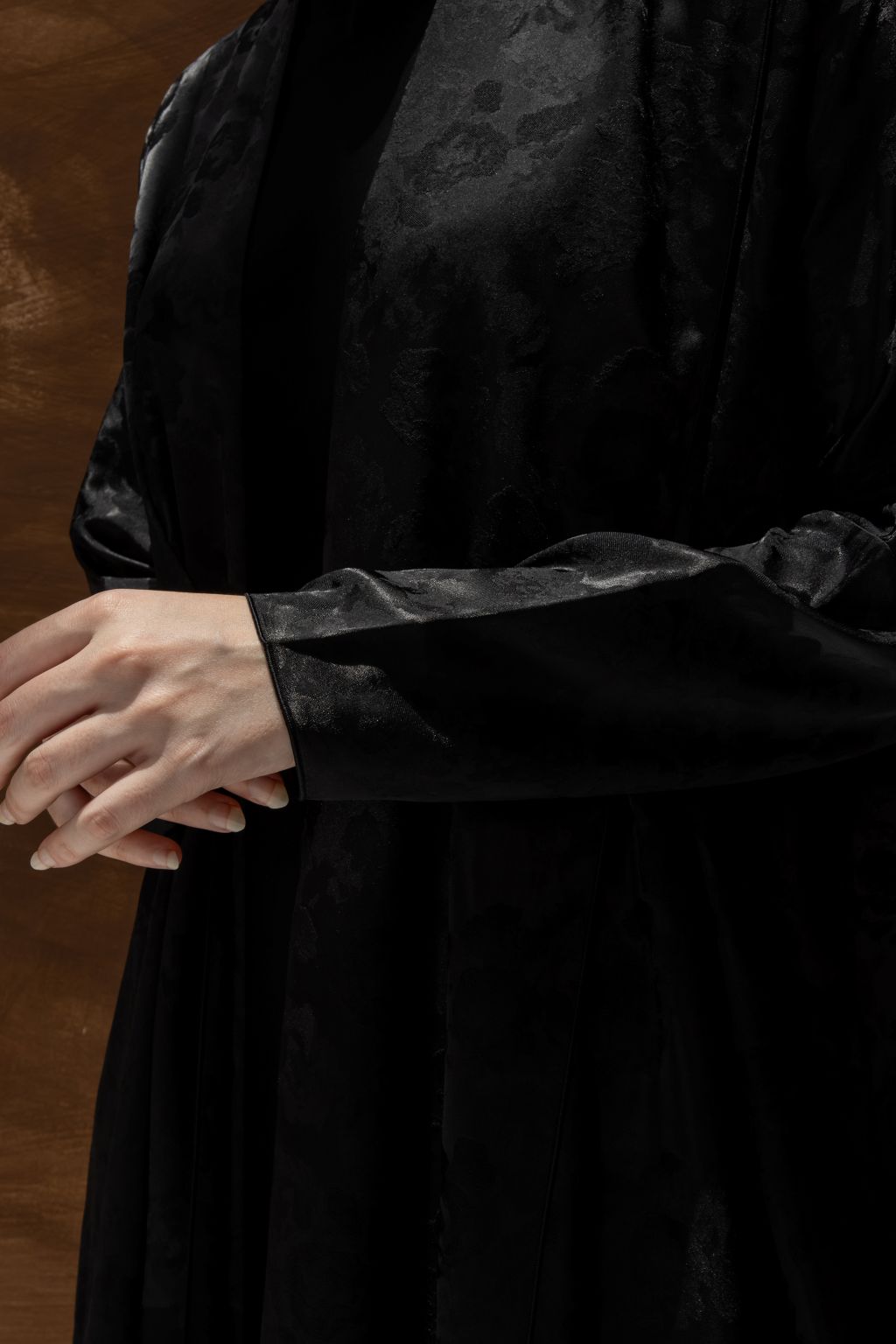 Selected Lines black Bahraini abaya for women with subtle floral patterns on the fabric