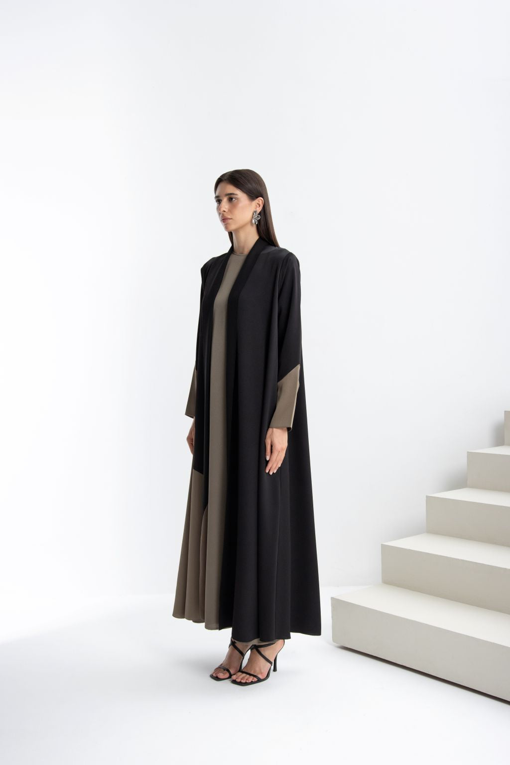 Elegant black designer abaya high quality with contrasting beige sleeves, perfect for modern fashion.