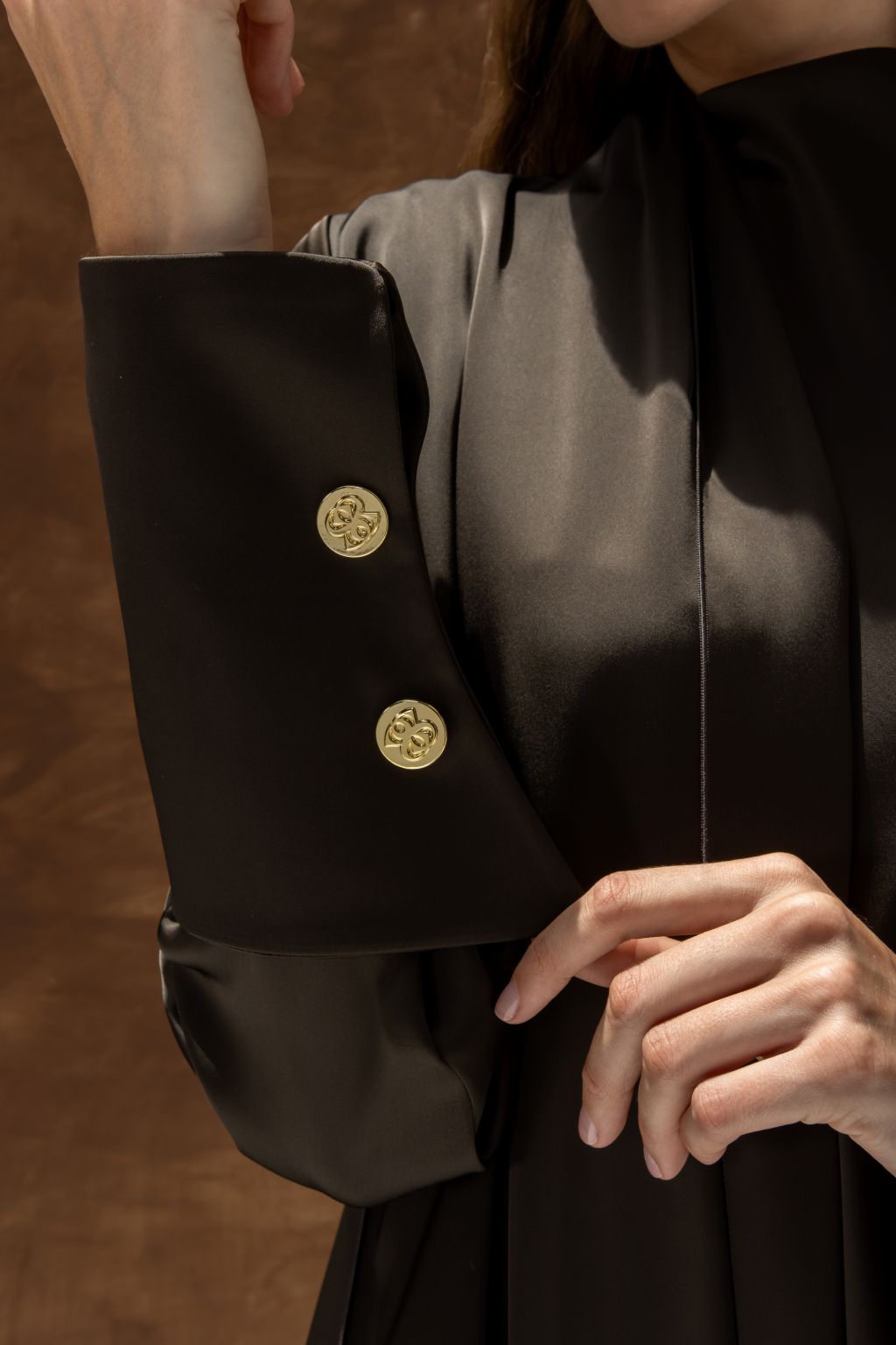 Selected Lines black elegant evening dress abaya with gold button details on sleeve