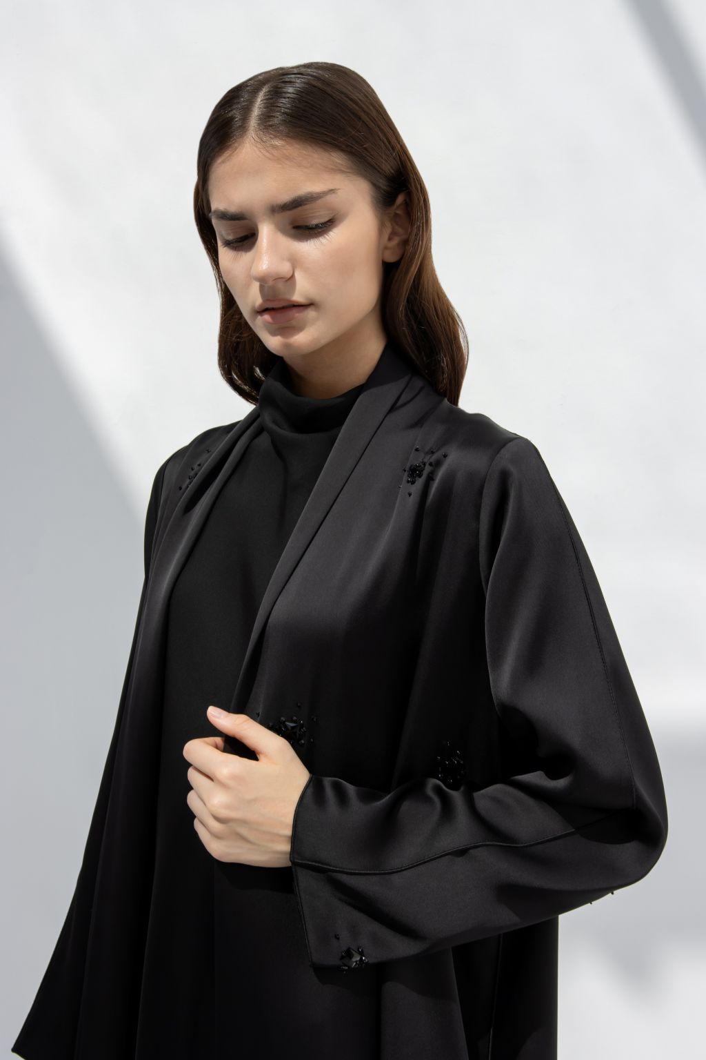 Selected Lines black formal abaya for women with elegant embroidery and flowing sleeves