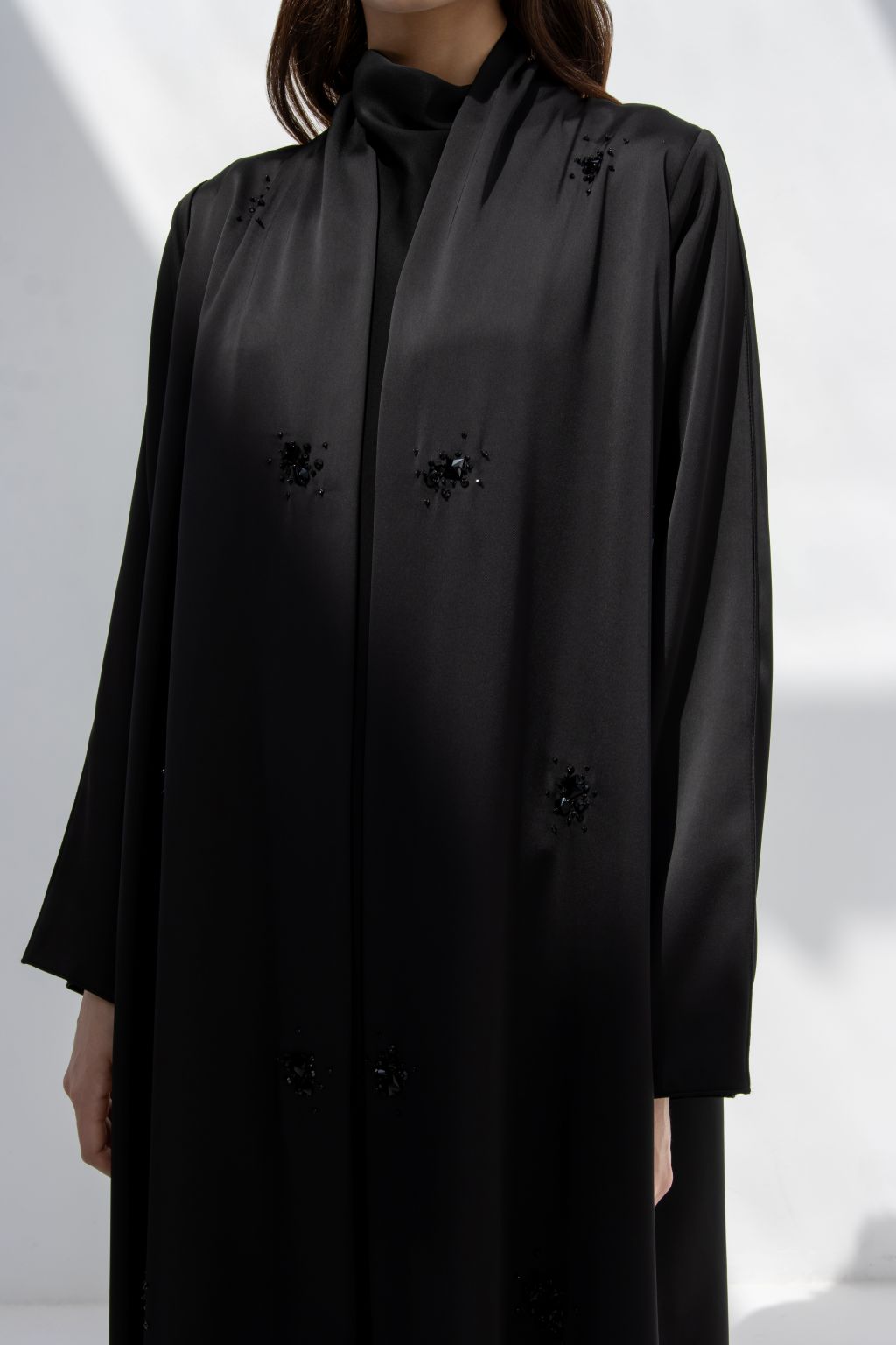 Selected Lines black formal abaya for women with subtle embellishments and long sleeves