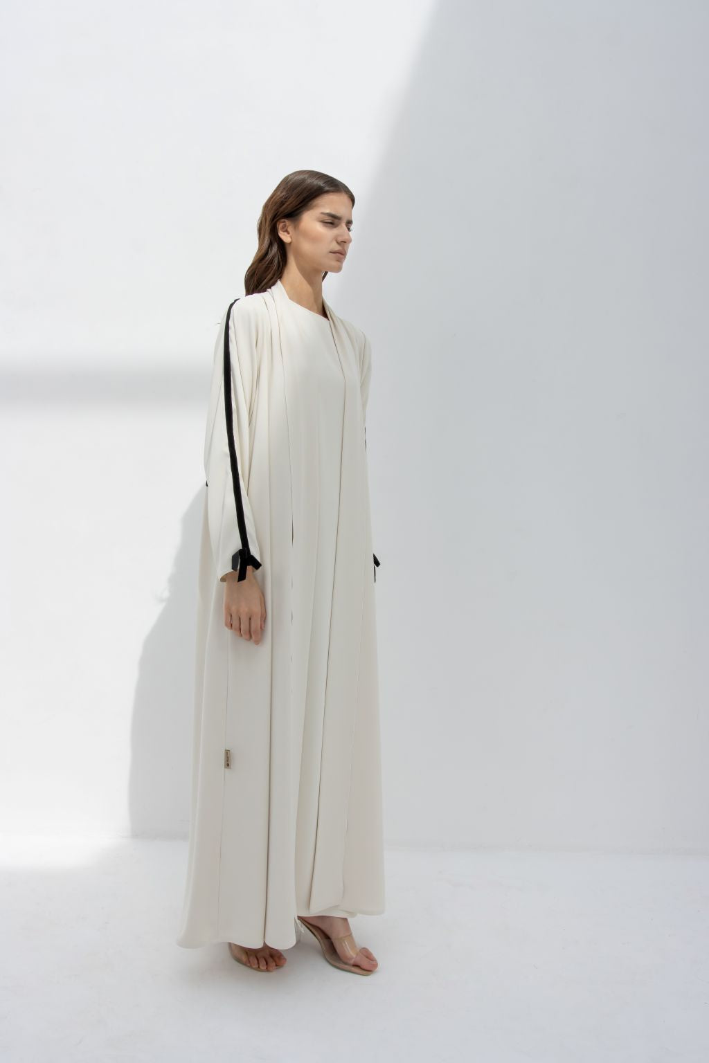 Elegant Abaya in Cream with Black Velvet Ribbon for Sewing at the Sleeves for a Stylish Touch