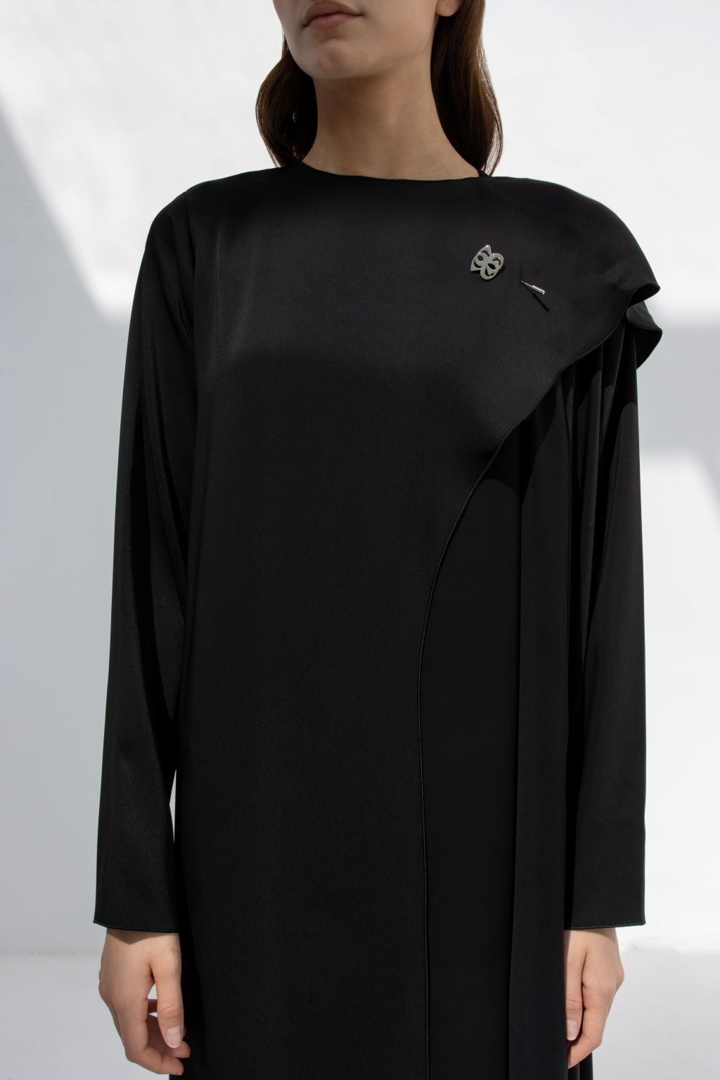 Selected Lines elegant flip wing abaya in black with long sleeves and unique draped detail