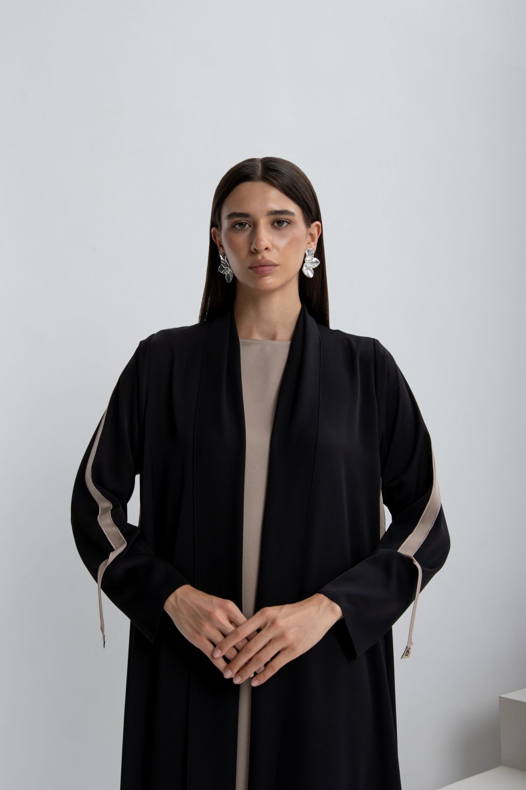 Elegant black designer abaya dress for occasions featuring stylish sleeves and refined details