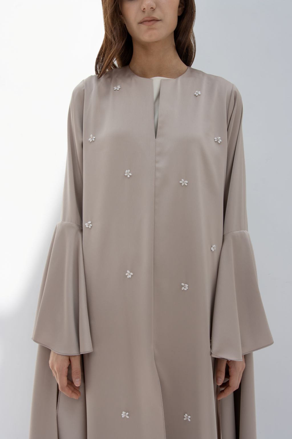 Selected Lines elegant seashell dress with long flared sleeves and delicate embellishments