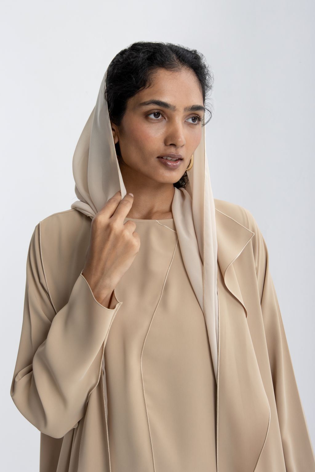 Elegant abaya for women in beige with a matching hooded scarf for a sophisticated look