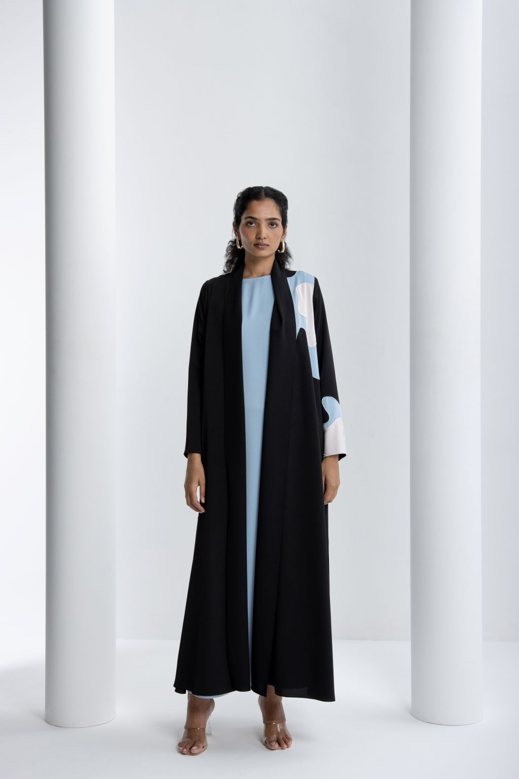 Elegant black and blue abaya with intricate design for a stylish and sophisticated look
