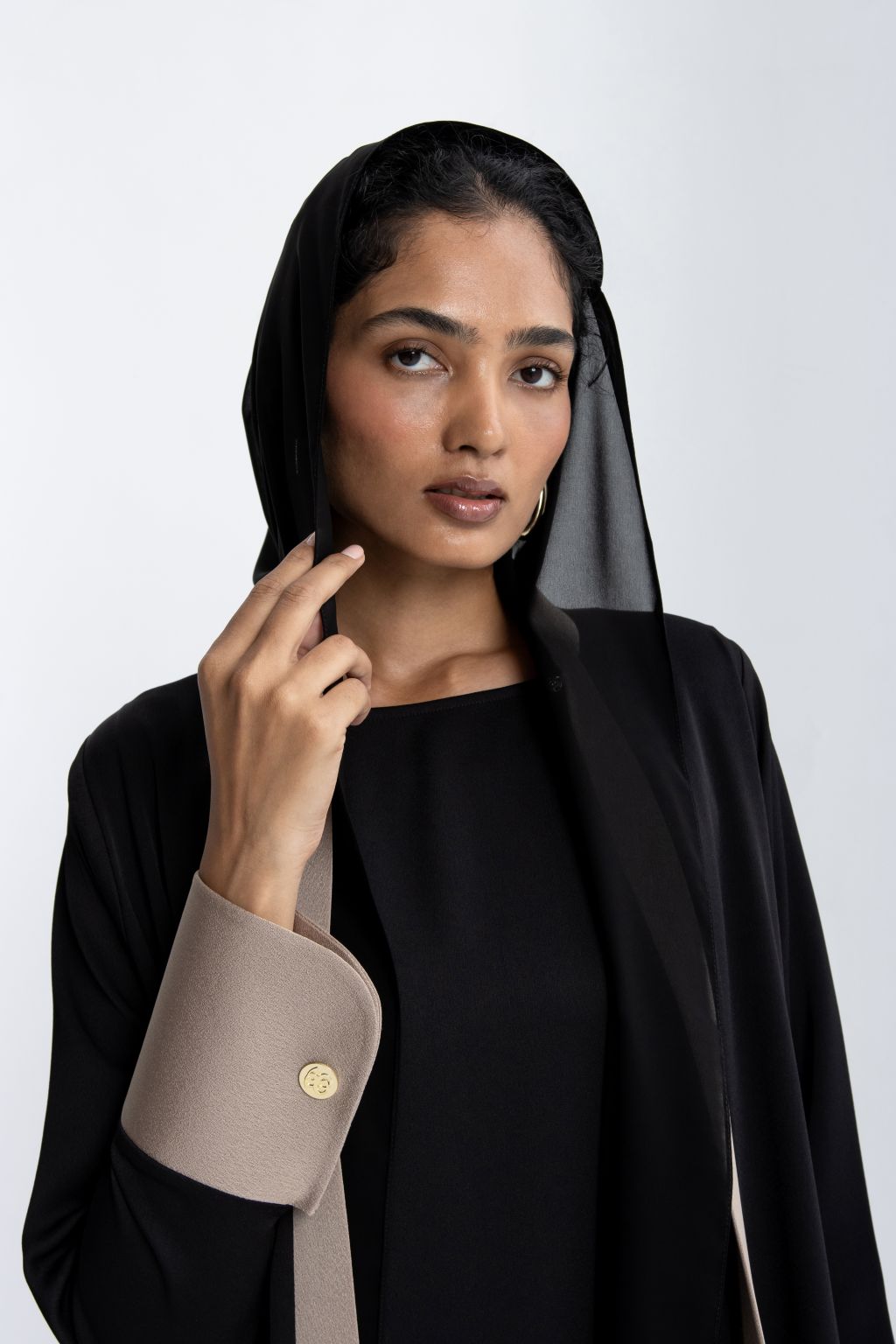 Elegant black modest abaya with stylish beige cuffs, perfect for formal occasions and daily wear