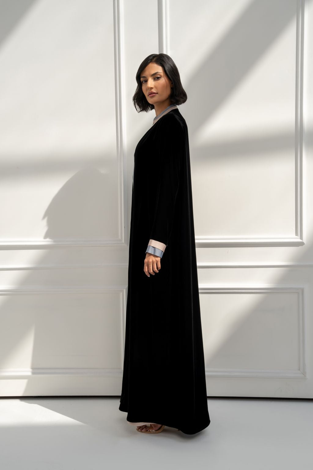 Selected Lines elegant black modest abaya with a luxurious velvet finish and chic cuffs