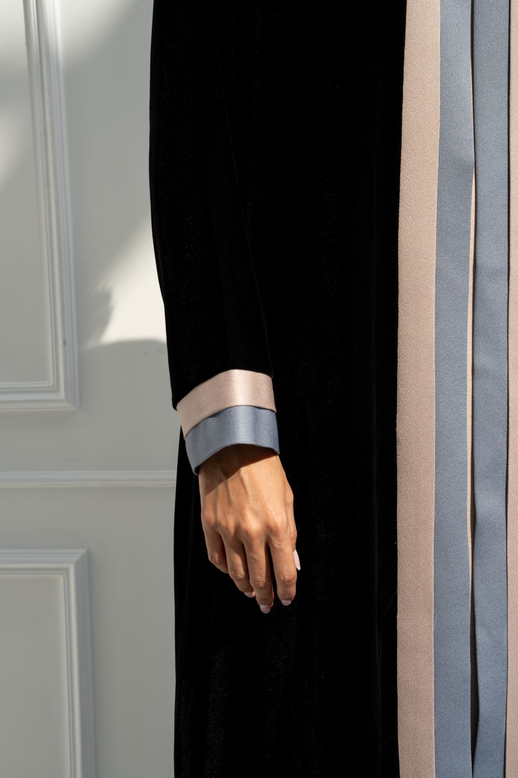 Elegant black modest abaya by Selected Lines with contrasting colored cuffs and sleek design for a sophisticated look