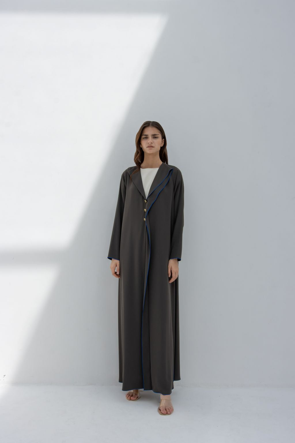 Selected Lines elegant Curve Buttons abaya in black with long sleeves and front button design