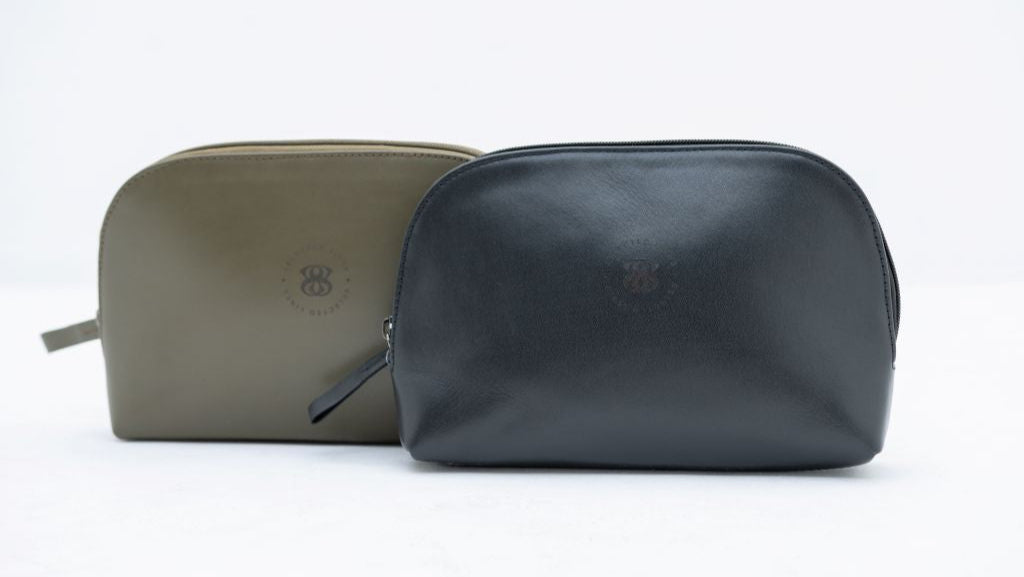 Selected Lines elegant leather pouch in black and olive green for stylish organization
