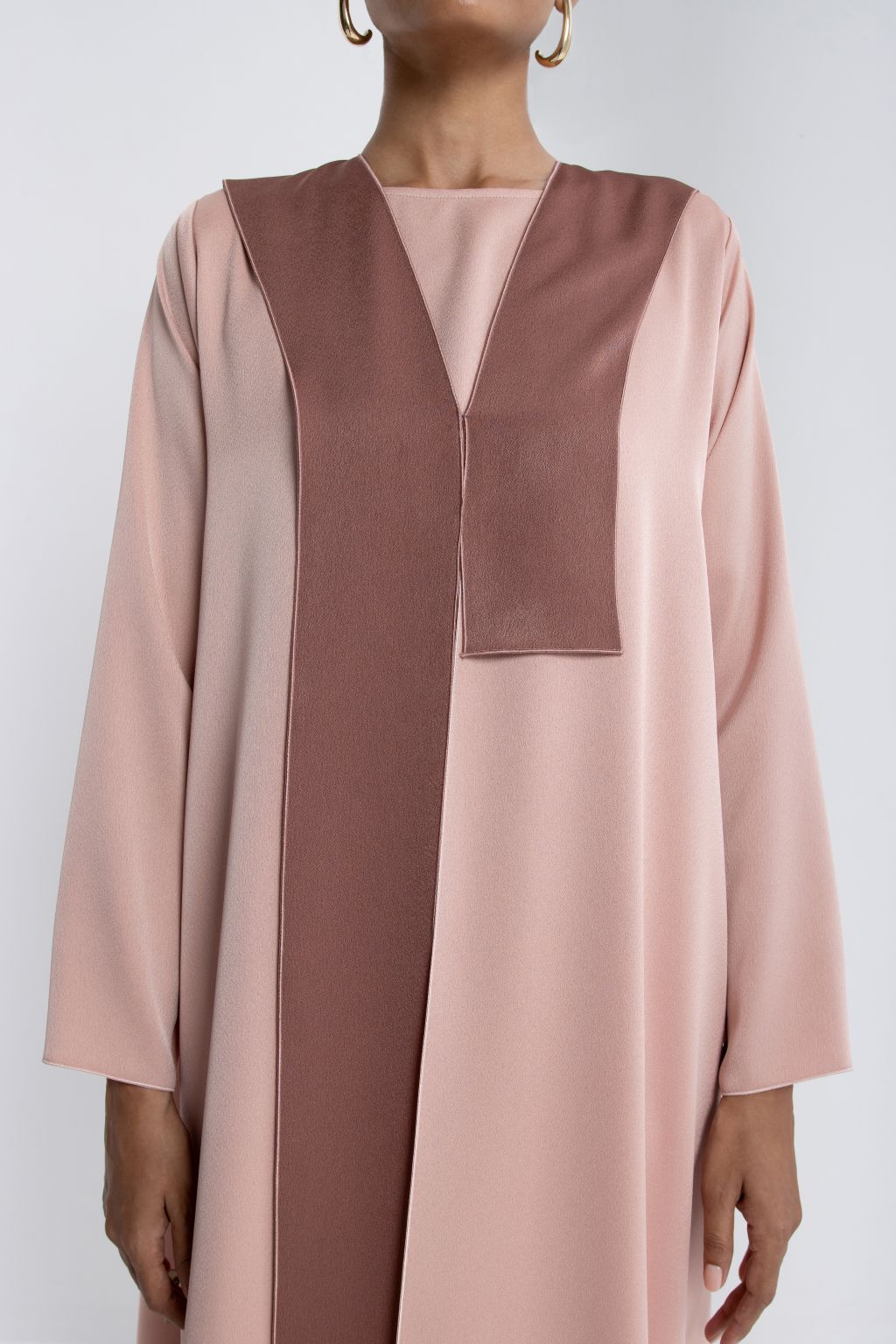 Selected Lines elegant modest fashion dress in soft pink and brown tones with a stylish design