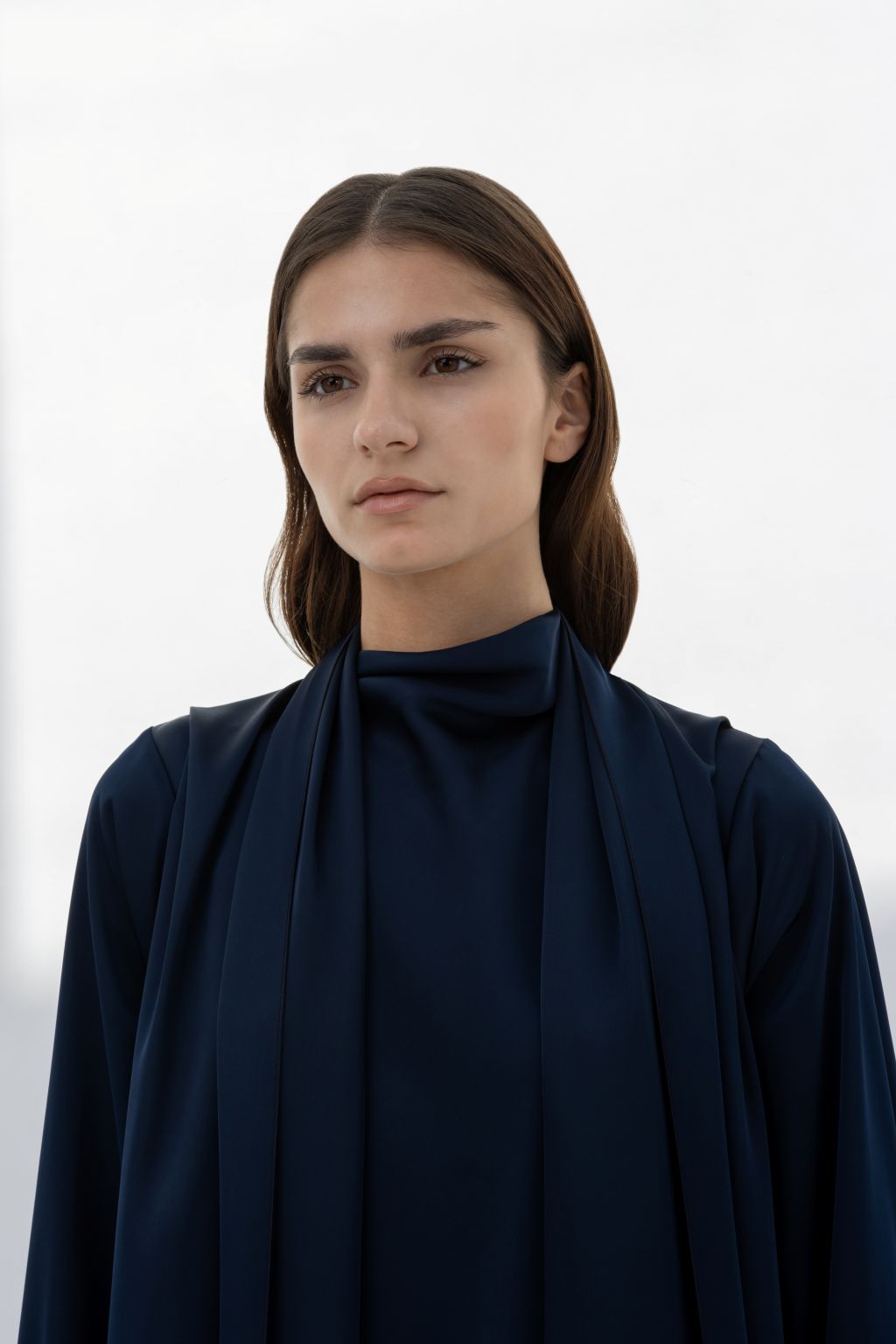 Navy Abaya by Selected Lines, showcasing elegant modest wear for women with a refined design