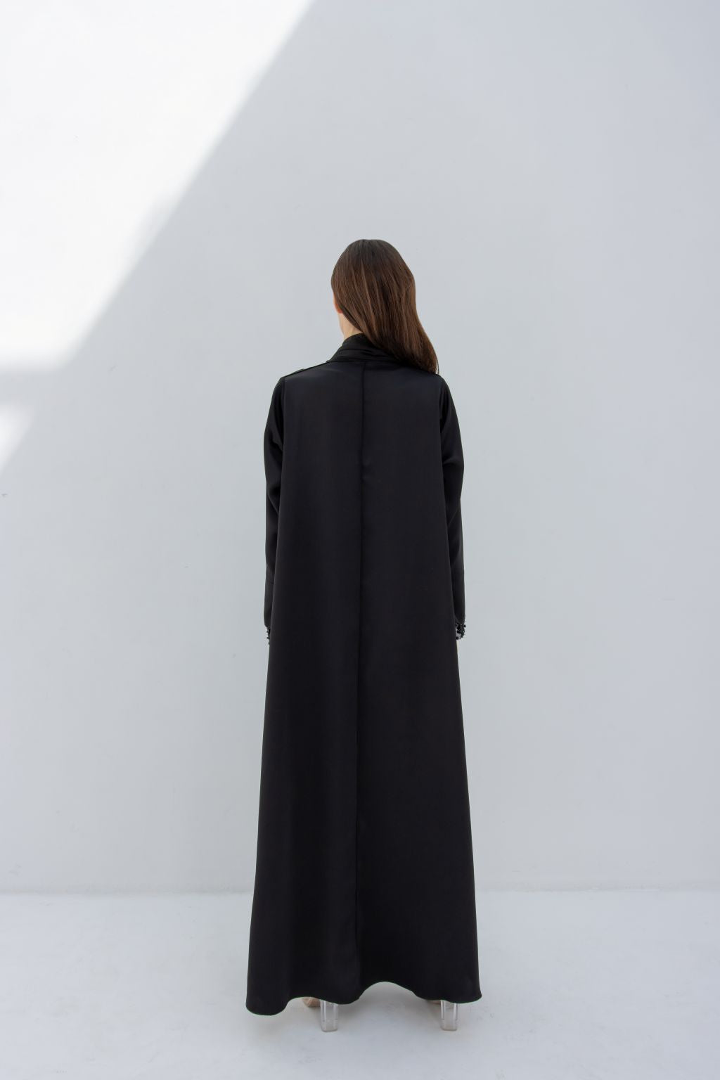 Back view of elegant sleeve crystals abaya by Selected Lines in black with long flowing design