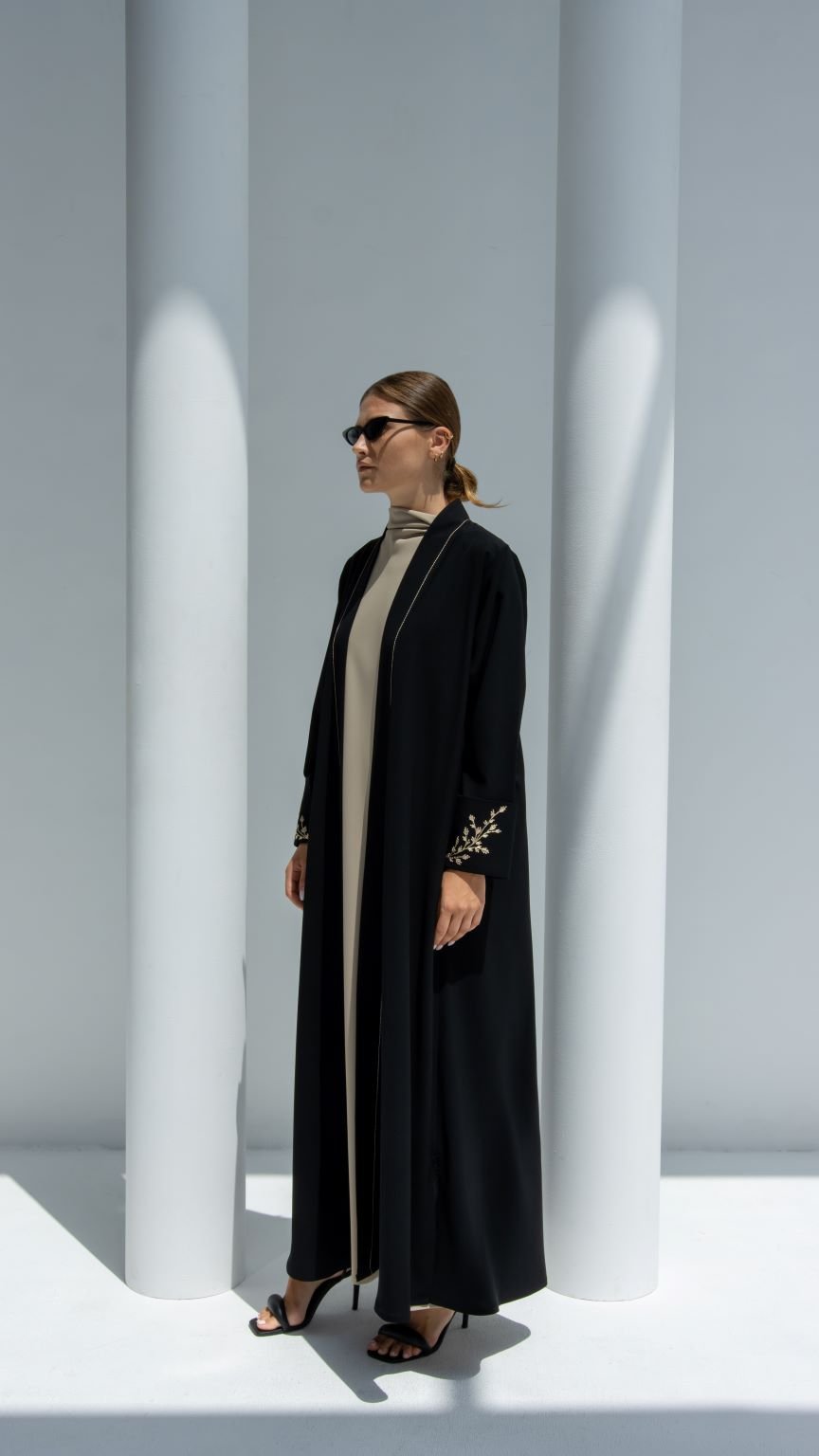 Side profile of Floral Sleeves Abaya highlighting elegant floral embroidery and black crepe material | Selected Lines