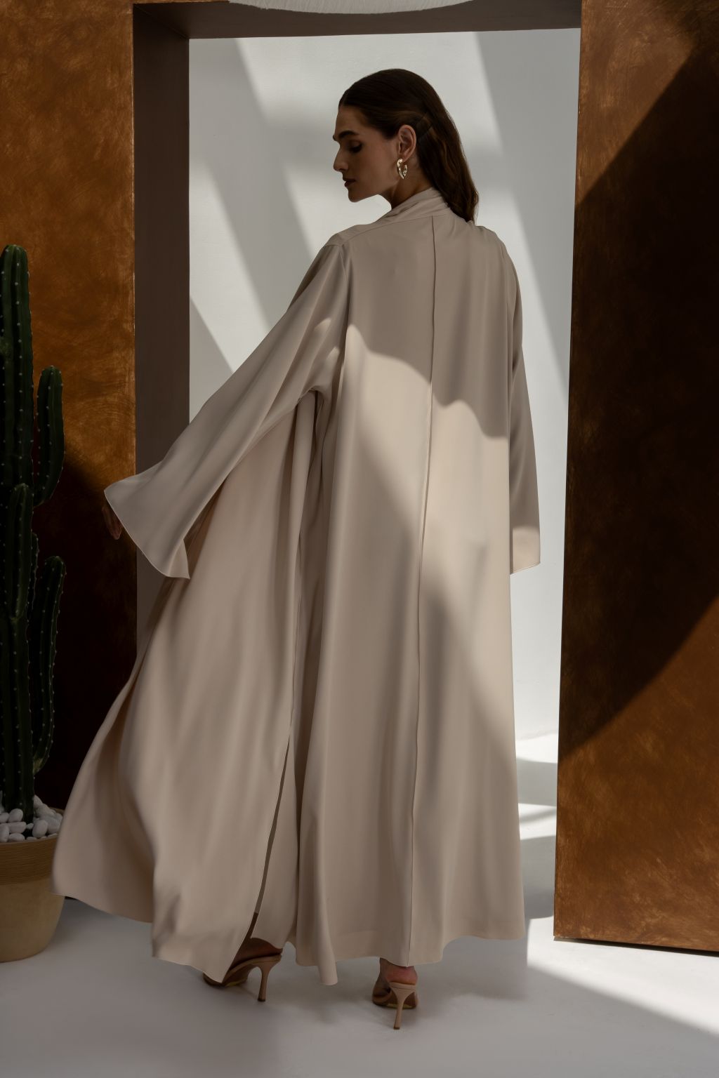 Elegant women's Franci abaya by Selected Lines in beige flowing fabric with long sleeves