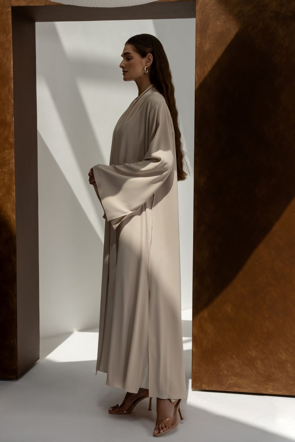 Elegant women’s Franci abaya by Selected Lines in beige with wide sleeves and floor-length design