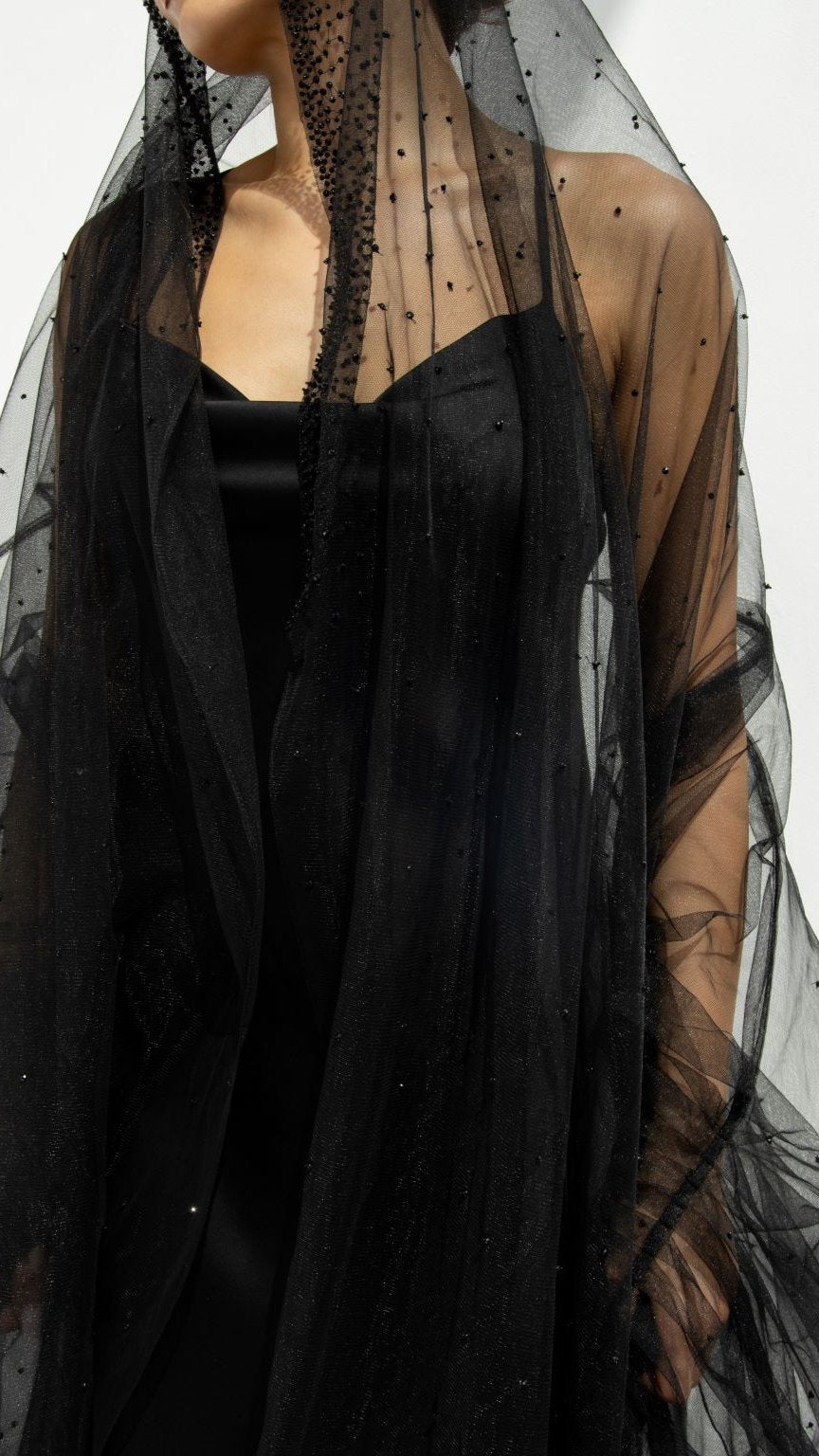 Georgina Abaya elegant design in black with a flowing sheer overlay and delicate embellishments