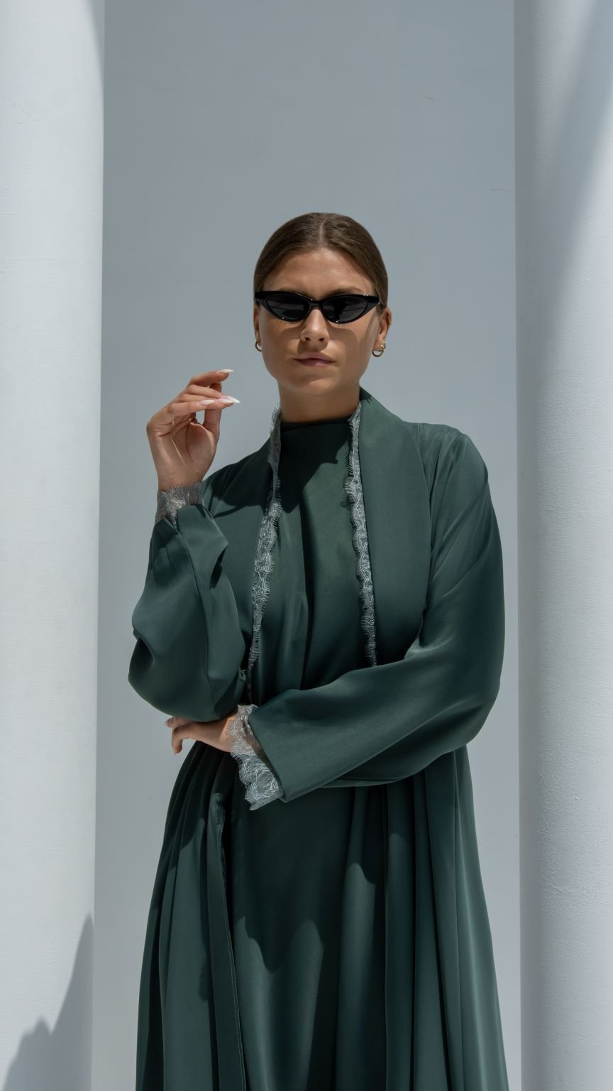 Front view of Half Lace Abaya in dark green Japan crepe fabric with floral lace design | Selected Lines