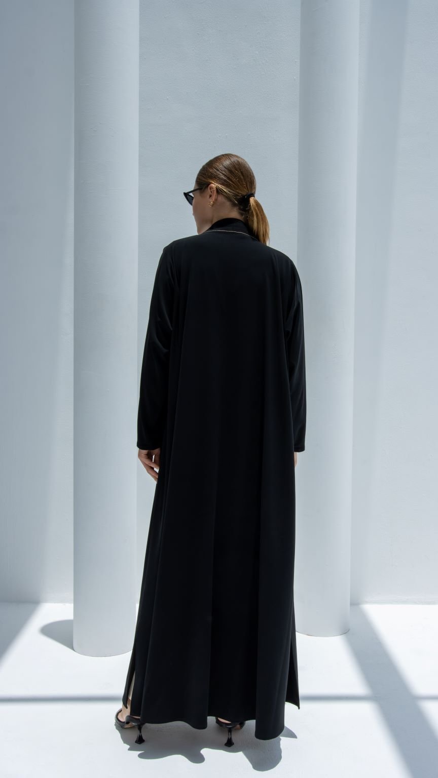 Back view of Hanging Flowers Abaya showcasing A-line fit and luxurious black crepe material | Selected Lines