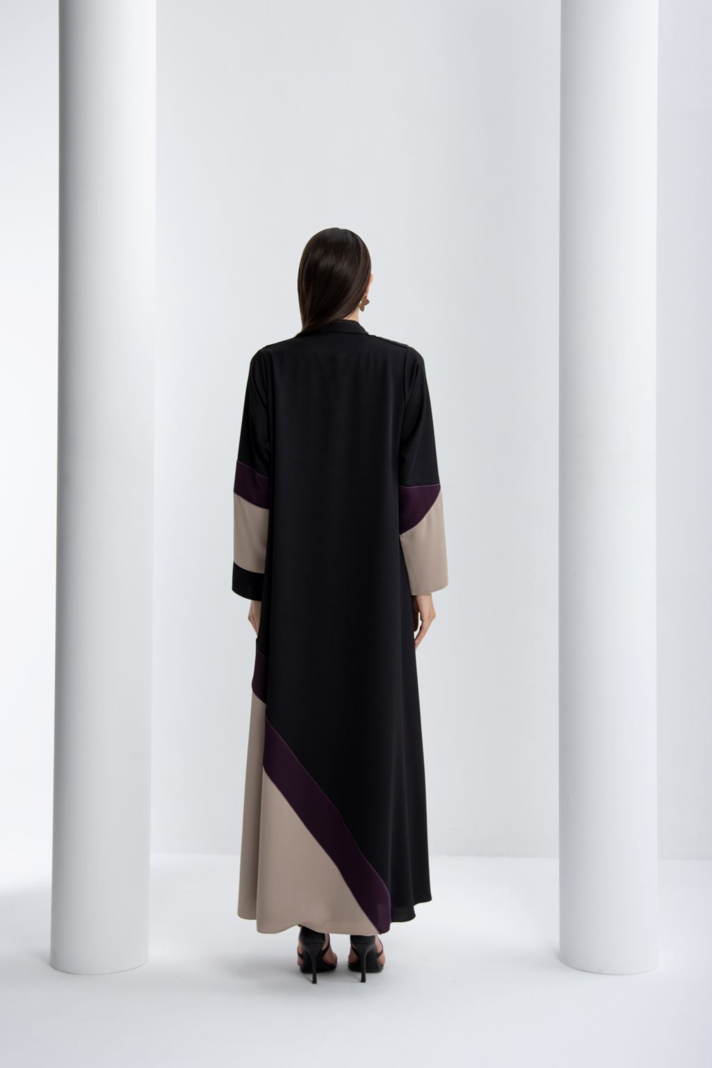 Elegant high quality abaya for special occasions featuring a stylish color block design in black and beige