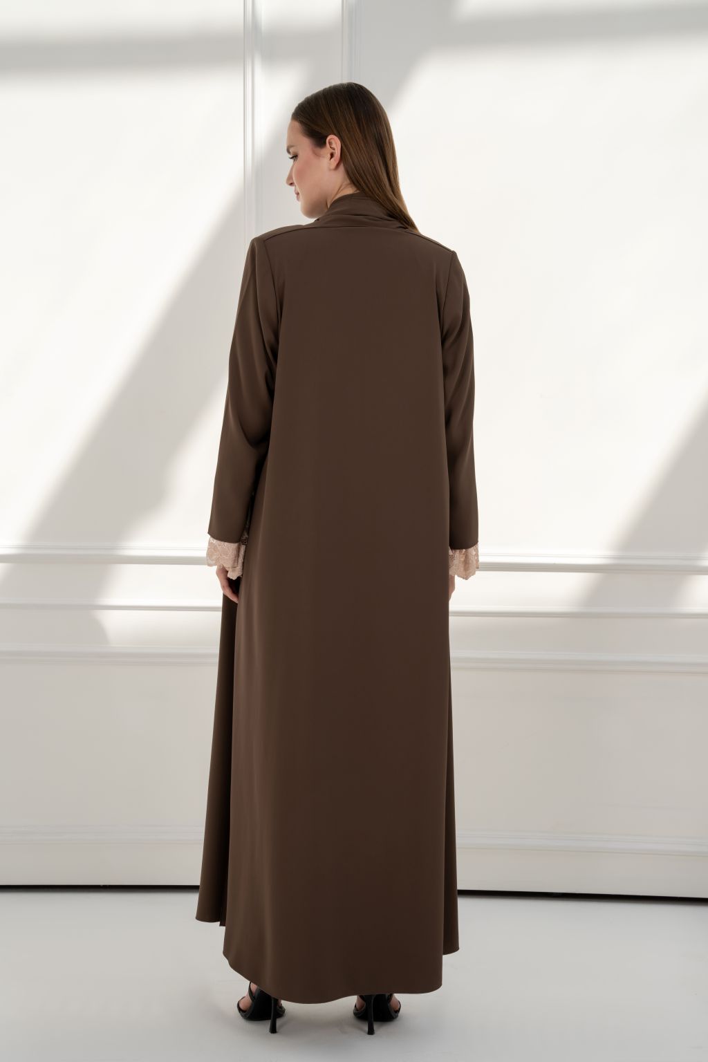 Back view of high quality abaya for women in brown with long sleeves and sleek design