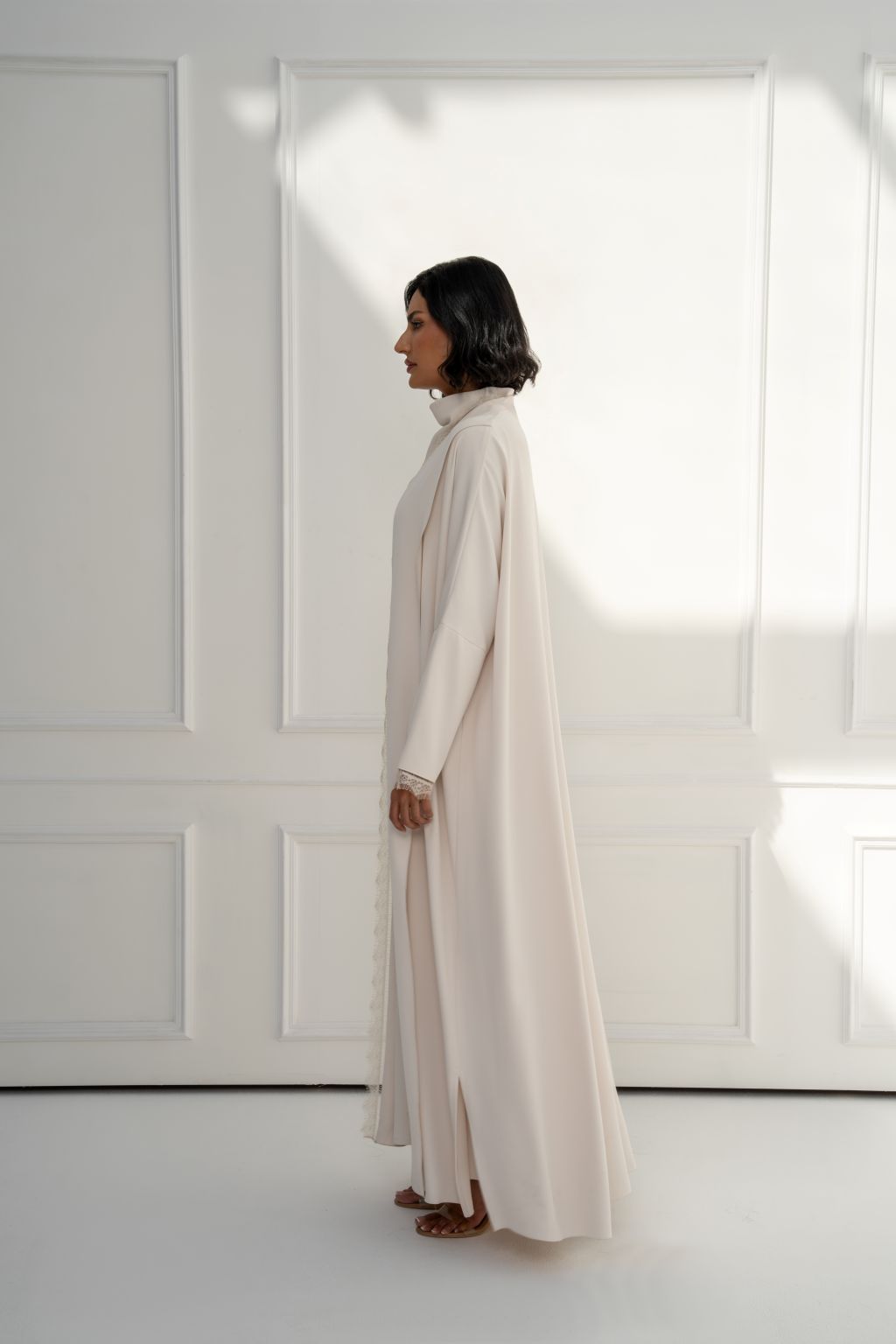 Elegant Selected Lines ivory abaya for women with a simple design and side slits for comfort