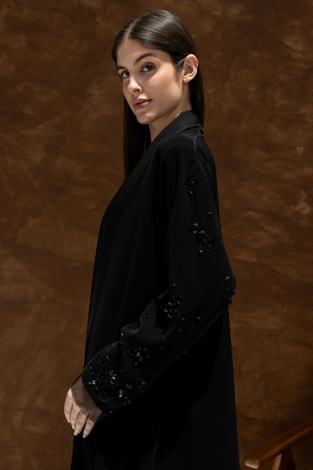 Selected Lines La Lueur abaya Set black with detailed embellishments on sleeves worn by a model