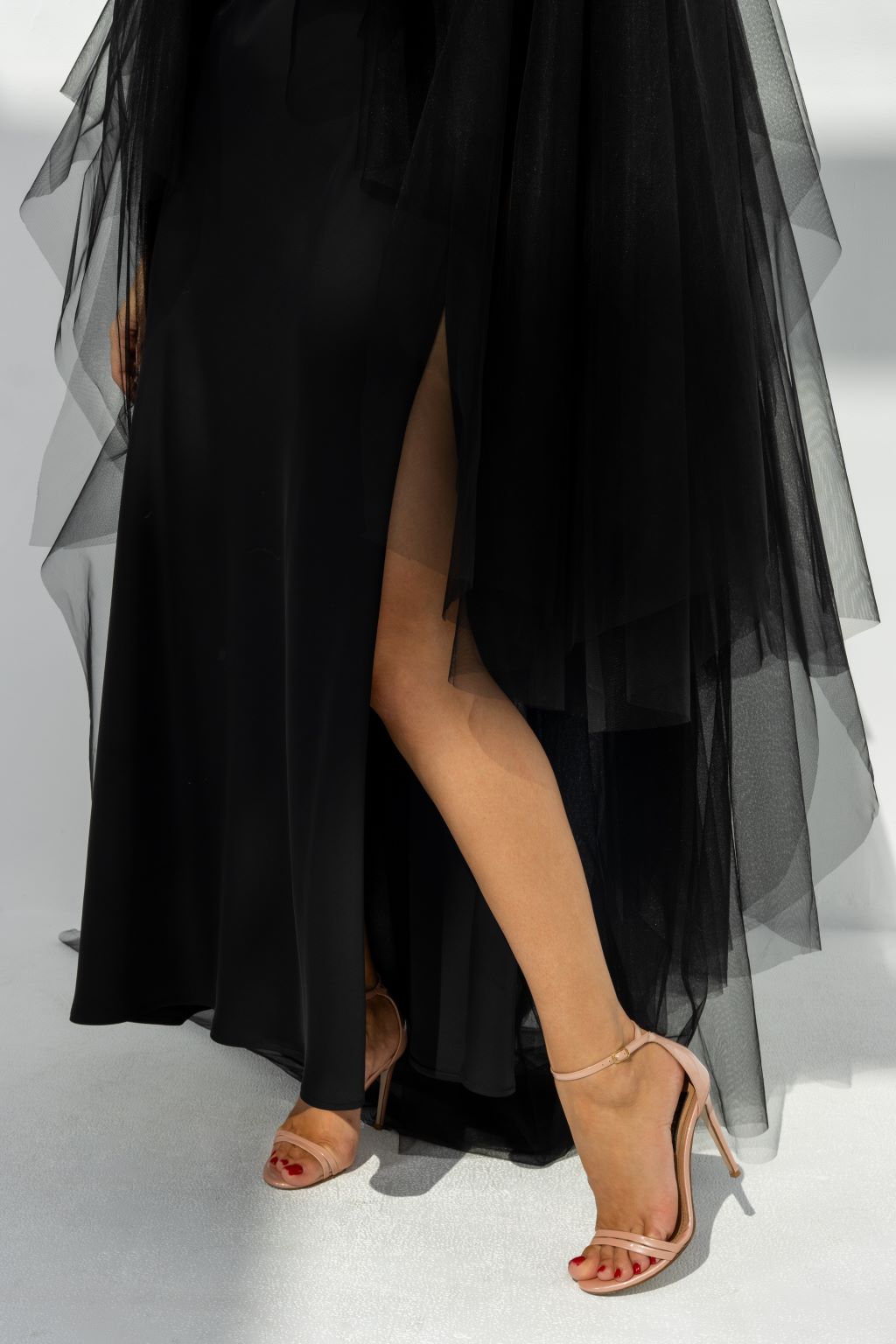 Close-up of Layered Elegance Tulle Abaya’s layered tulle design in black fabric | Selected Lines