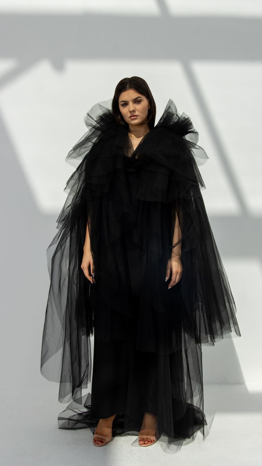 Front view of Layered Elegance Tulle Abaya in black tulle fabric with layered design | Selected Lines
