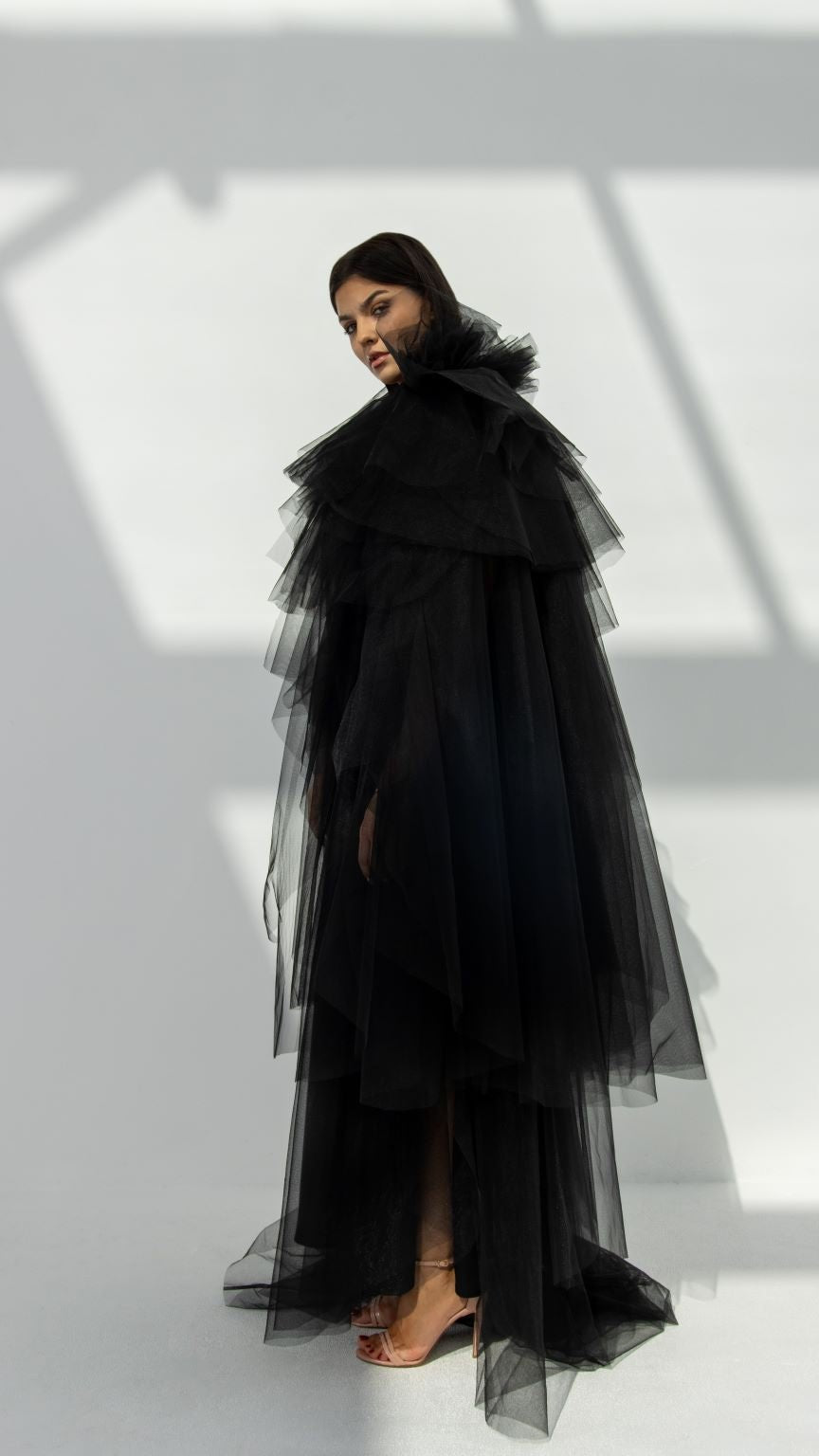 Side profile of Layered Elegance Tulle Abaya highlighting the non-stretchy tulle fabric and layered detailing | Selected Lines