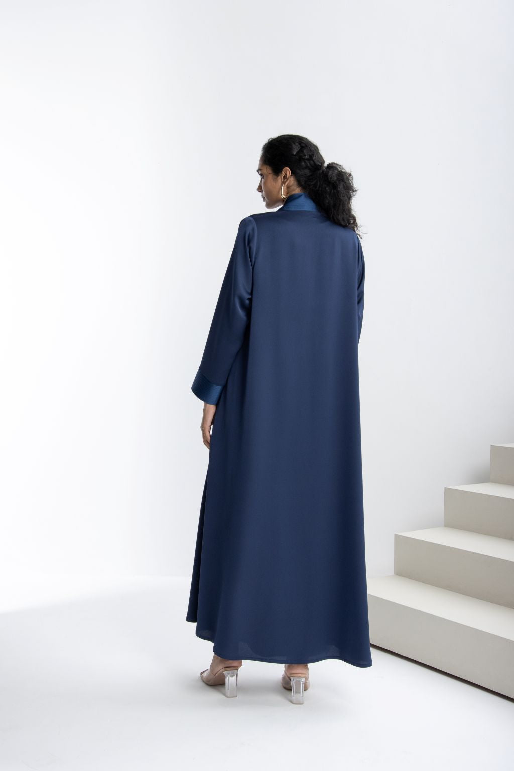 Elegant navy luxury abaya for women featuring a classic design and flowing silhouette