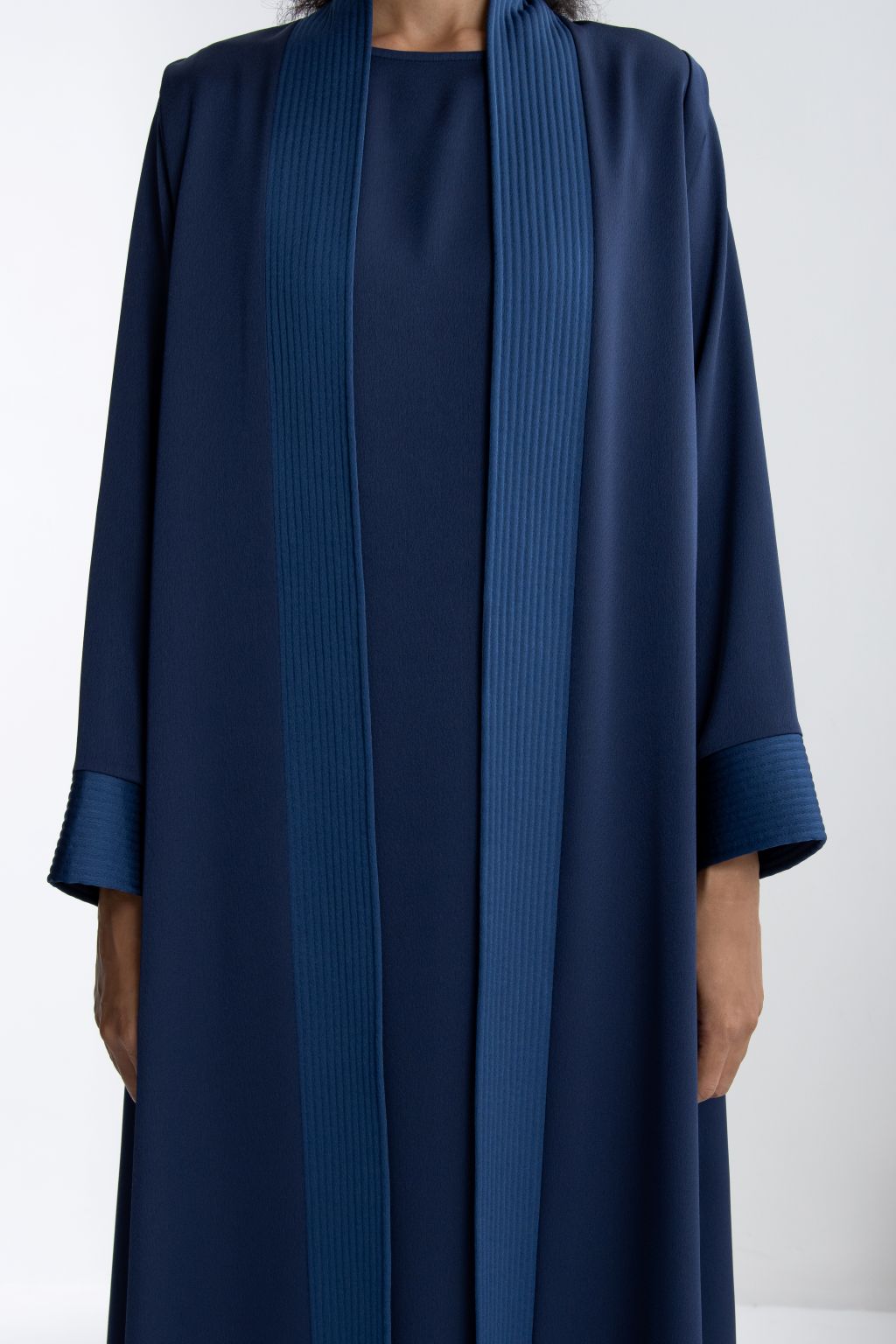 Elegant navy luxury abaya for women with pleated detailing and long sleeves