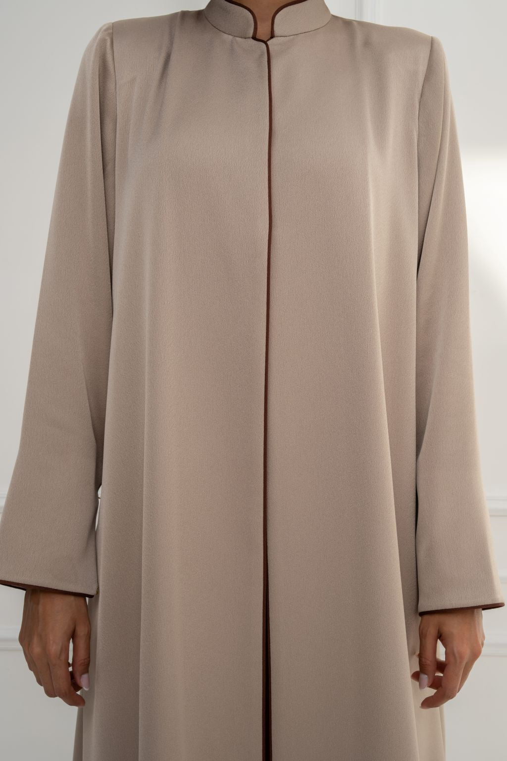 Selected Lines luxury beige long coat for women with a minimalist design and elegant silhouette