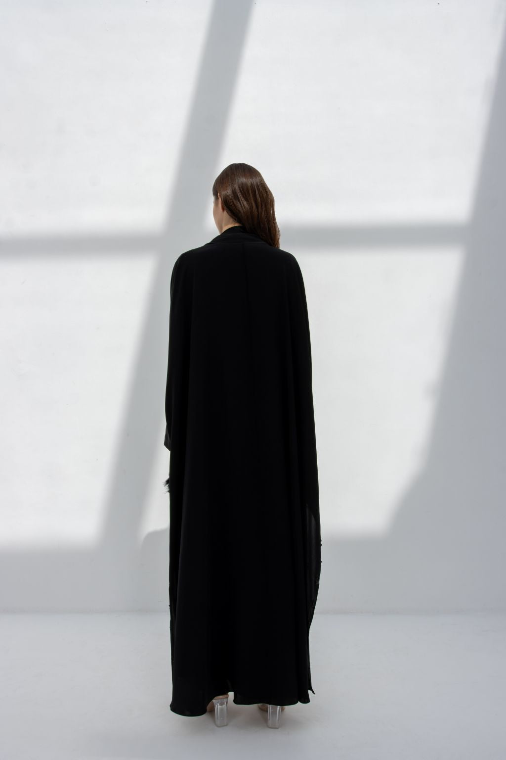 Elegant luxury black abaya featuring a flowing design, perfect for modest fashion enthusiasts