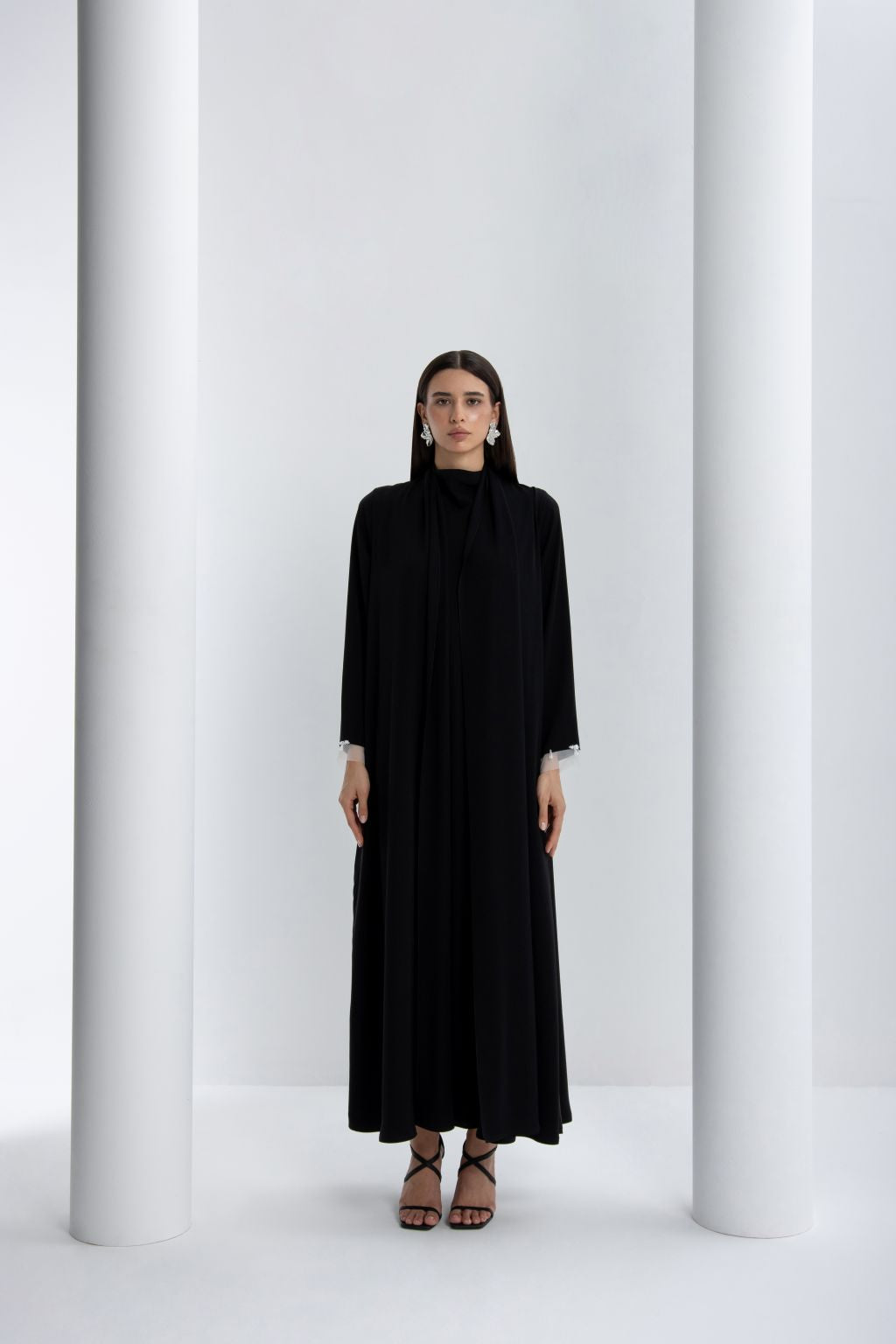 Elegant luxury black abaya for women featuring flowing silhouette and chic design perfect for special occasions