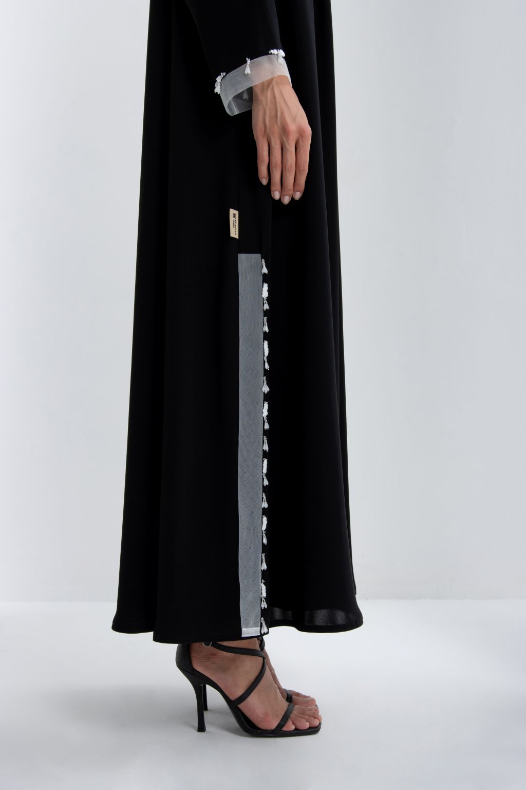 Elegant luxury black abaya for women featuring intricate detailing and sleek design