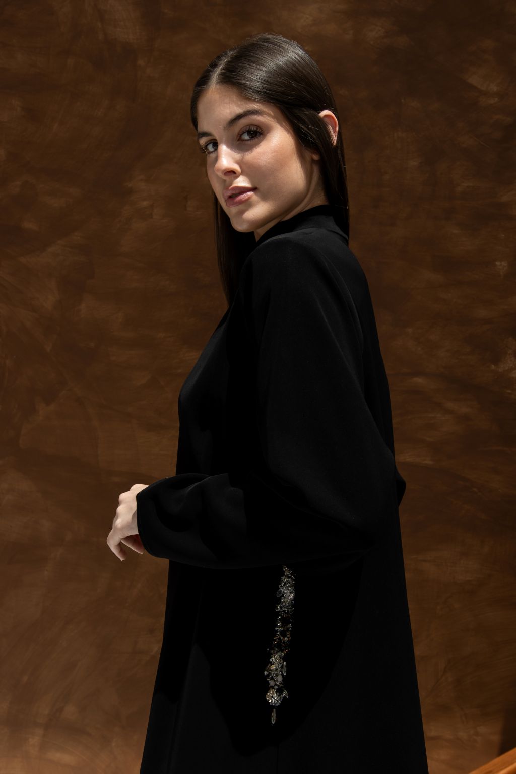 Elegant luxury black abaya with hidden pockets, designed for comfort and sophistication