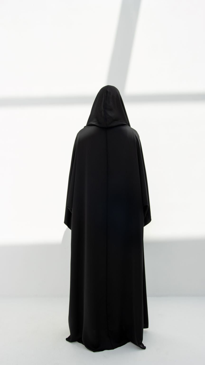 Luxury black hoodie abaya in a sleek design, perfect for stylish and modest wear