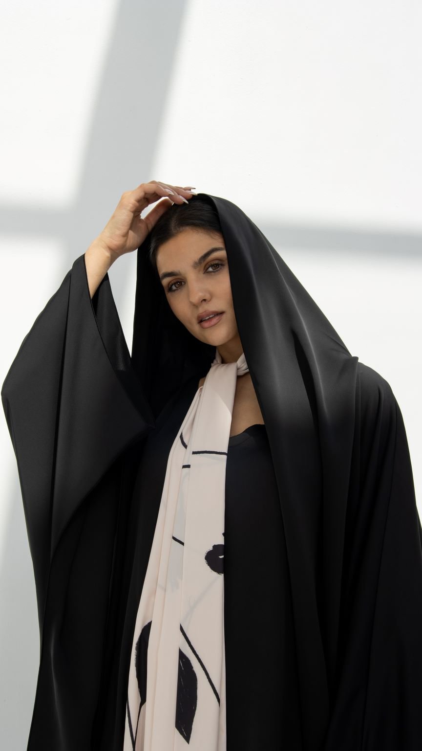 Elegant luxury black hoodie abaya with flowing sleeves and stylish headscarf