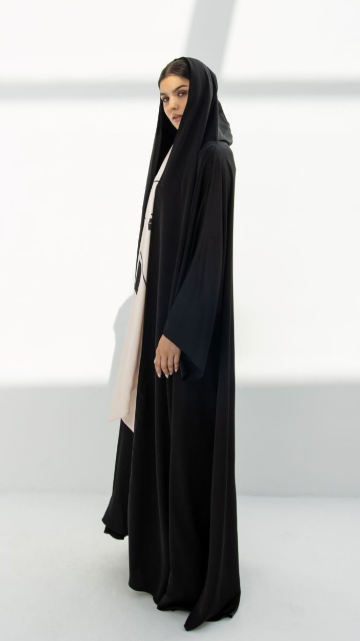 Elegant luxury black hoodie abaya with flowing design and stylish hood for modern fashion enthusiasts