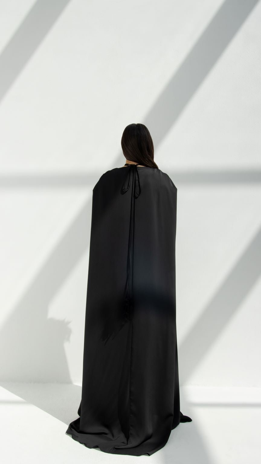 Selected Lines luxury cape chain abaya in black shown from back with flowing cape design