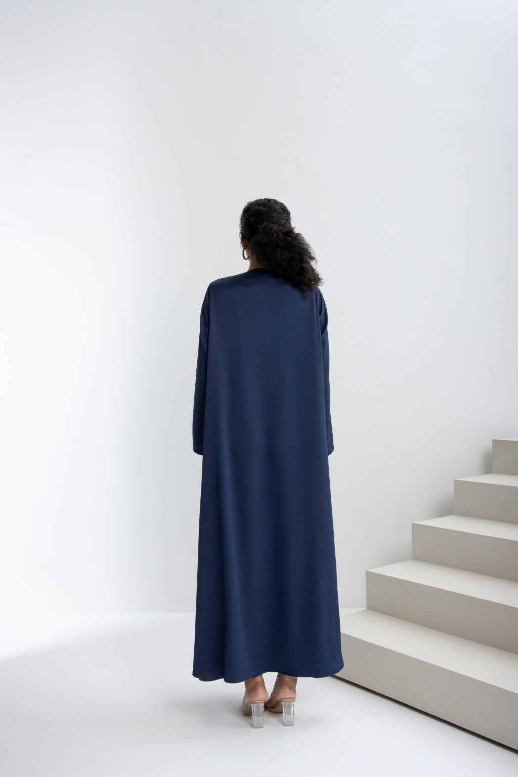 Elegant back view of a luxury embroidered abaya in navy blue, perfect for formal occasions