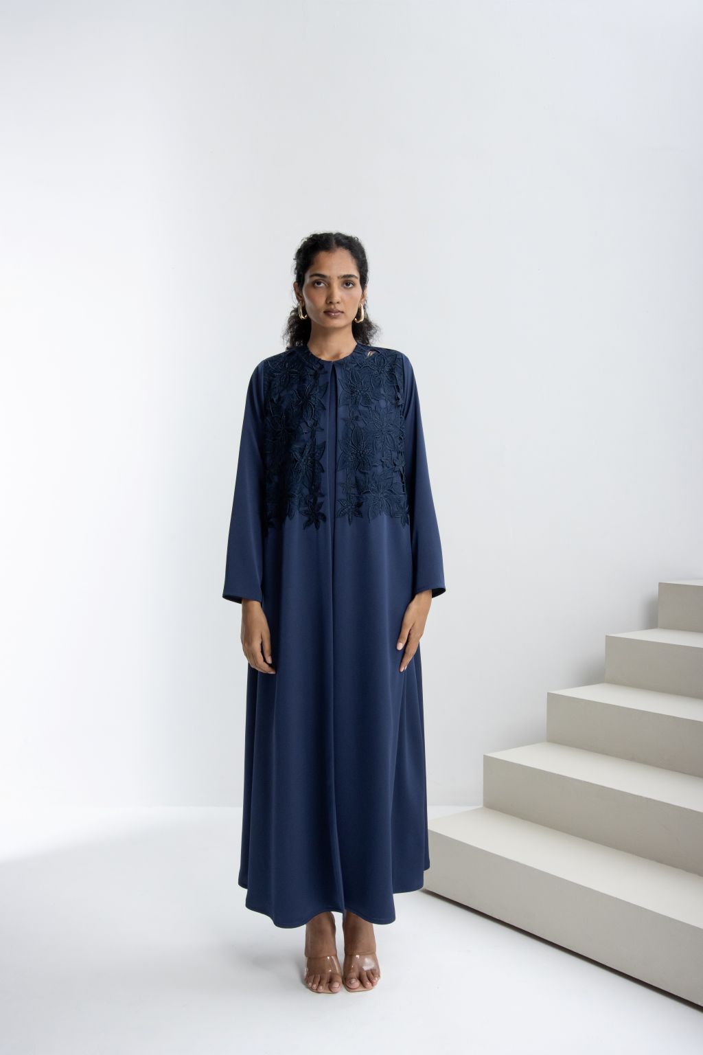 Luxury embroidered abaya in navy with intricate floral designs for elegant styling