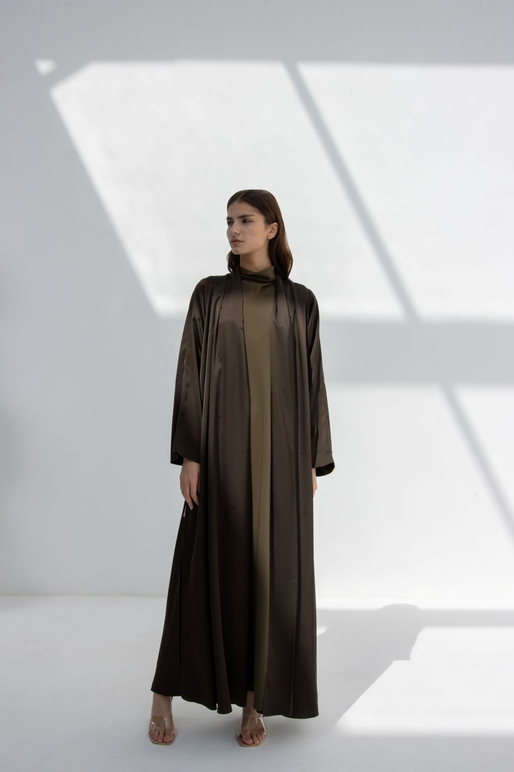 Selected Lines luxury evening stone abaya in dark brown with flowing fabric and modest design