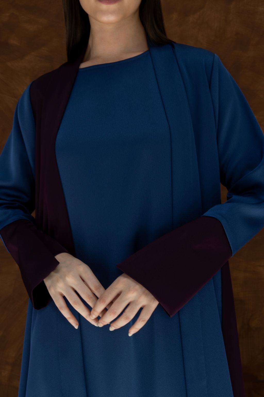 Luxury HueLine blue abaya by Selected Lines with contrasting dark sleeves and elegant design